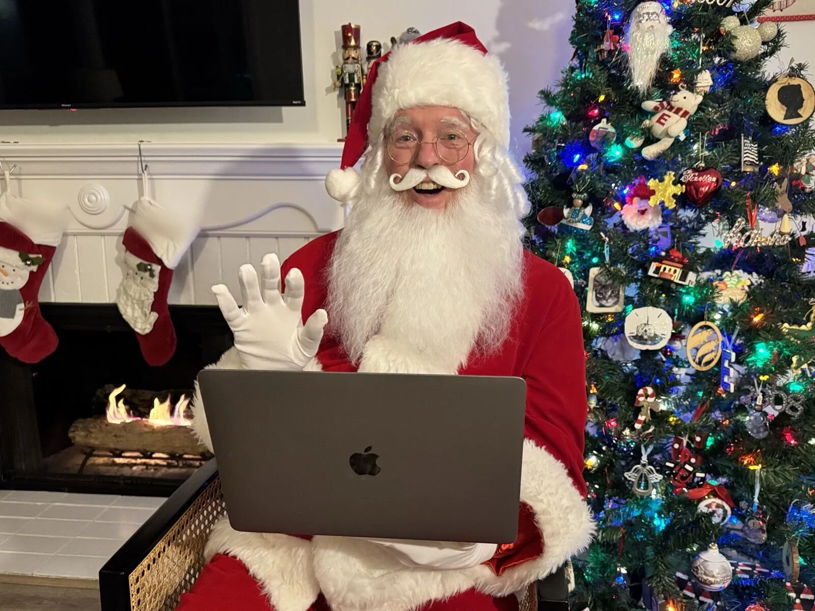 Santa in his velvet suit on a live video call